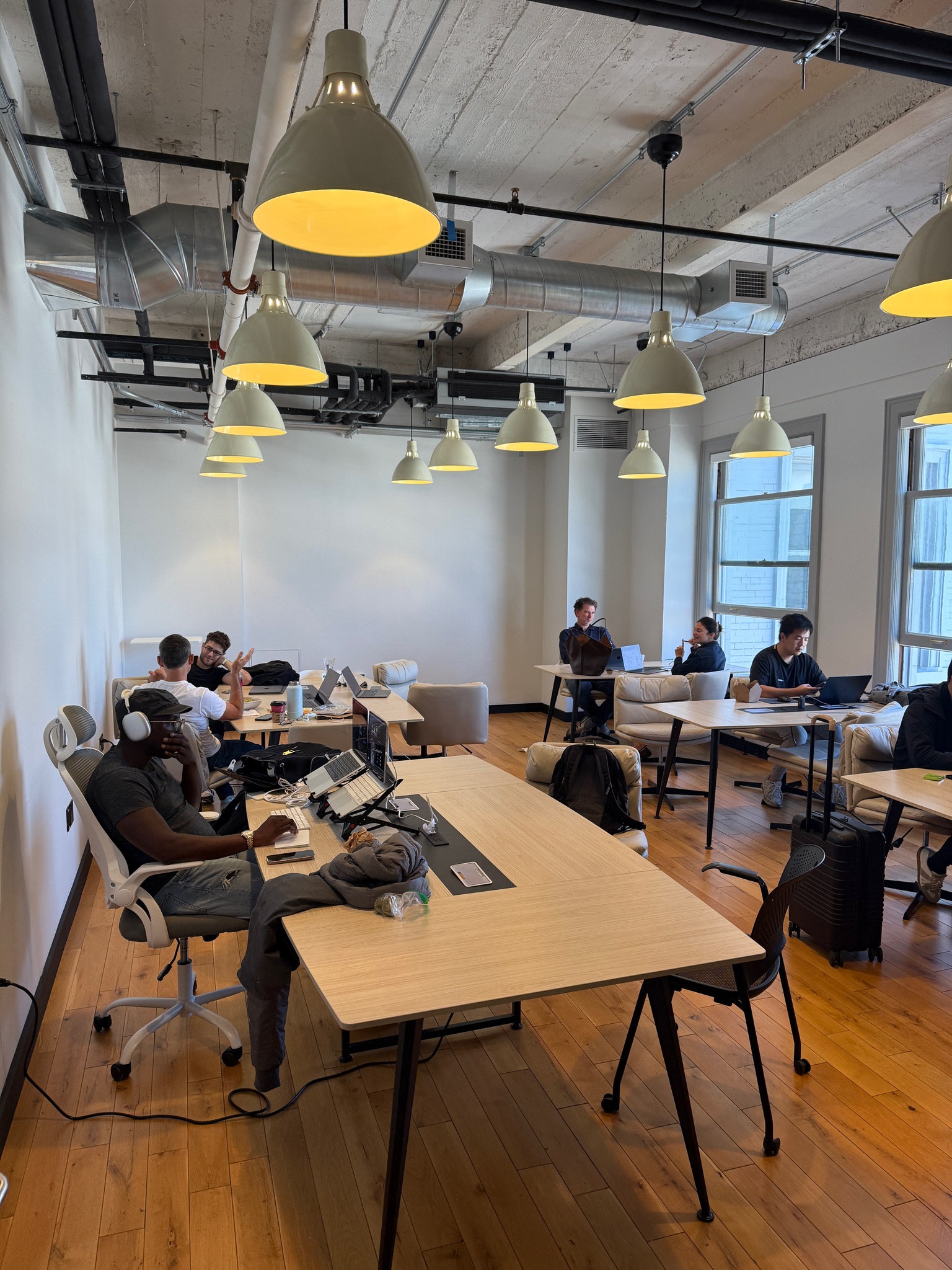 Coworking space with people working at tables